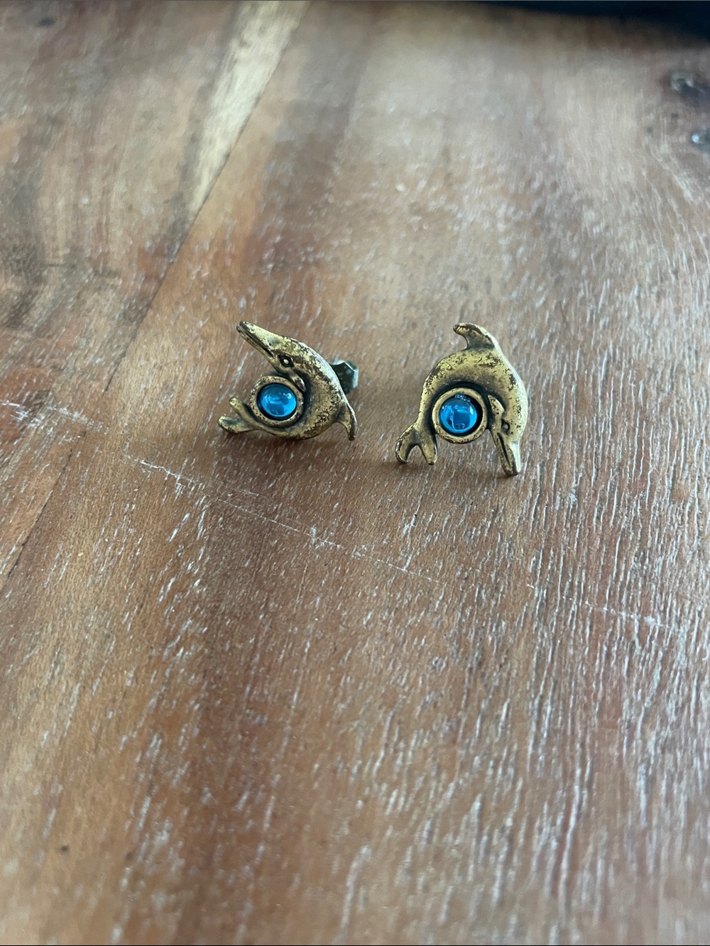 Gold Dolphin Stud Earrings with Blue Stone